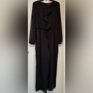 Jennifer Lopez Black Attire with Red Accents